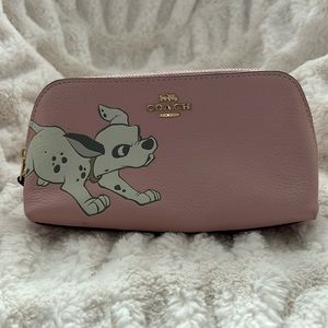 Coach Disney Dalmations cosmetic bag. Slightly used. Small mark on back of bag.